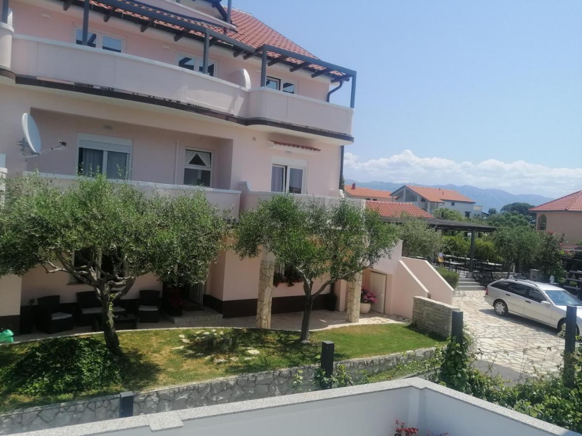 Apartmani Simon Lopar Buitenkant foto